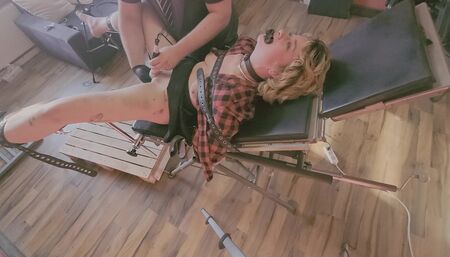 Blonde Teen restrained on medical chair