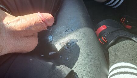 Beary Hairy busts a load  of cum in an outdoor parking lot