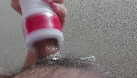 Stroking with a tenga cup