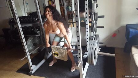 Tia lifts and shows off her toned and hot body