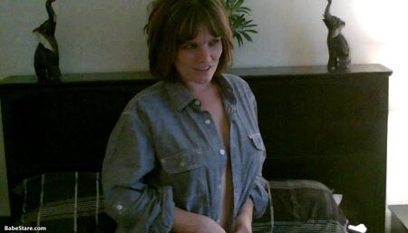 Misty in a polo shirt is about to get naked