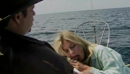 Blonde babe with an amazing body cuking a cock on a boat