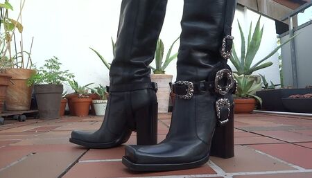 Waiting on the terrace in exclusive leather boots