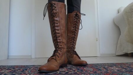Brown lace-up boots show