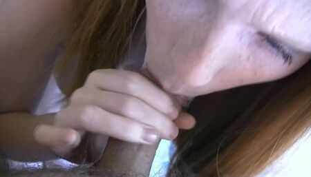 Redhead teen with puffy nipples sucking white cock