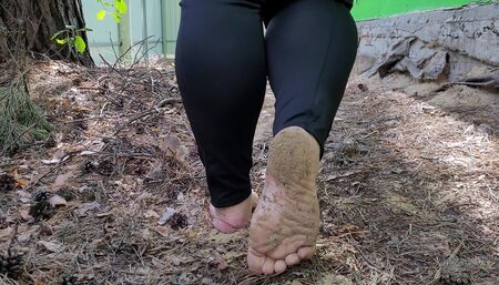 Massage dirty feet with spruce cones