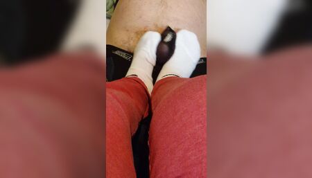 Stomping his cock with my white socks