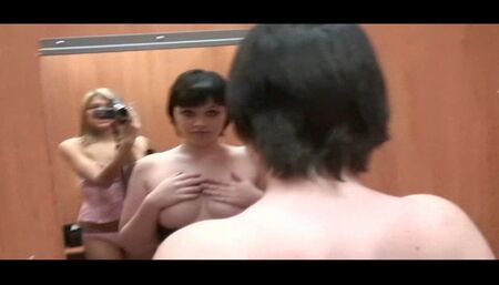 Two girls at  fitting room