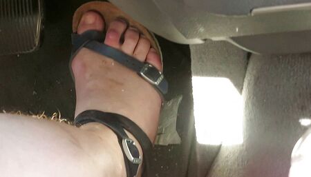 Pedal Pushing Nurse Vicki works her car pedals  in sandals