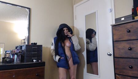 Big puffy winter coat smoking