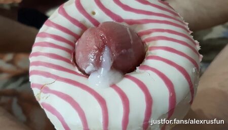 Horny skinny teen fucks a donut with a big dick