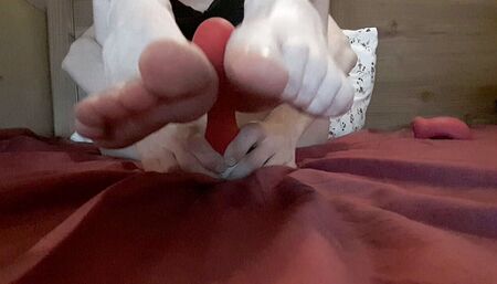 Horny amateur teen's foot fetish. Masturbation with toys.