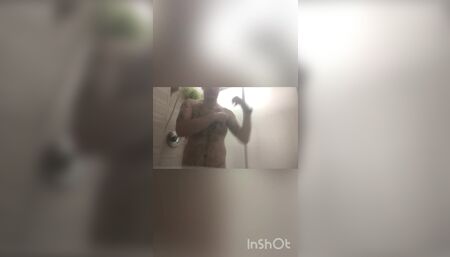 Boy up takes a shower and then