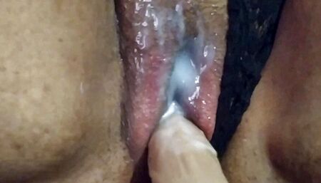 Playing with used pussy and full of cum.