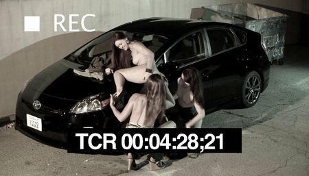 Naughty lesbian babes didn't stop fucking on the parking lot