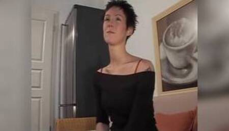 Shorthair amateur spreads her pussy