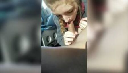 Blonde college girl with braids sucks cock in the car