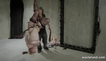Hot Blonde Hogtied And Suspended Upside Down While Dominated With Whips