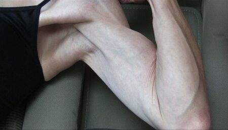 Lilly, her biceps, the back seat, the muscle worshipping