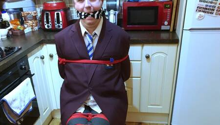 Man in adult school uniform bound and gagged on kitchen floor - cam 1 part 1