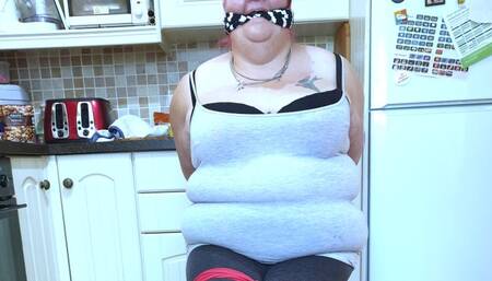 BBW woman bound and gagged on kitchen floor 2