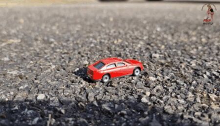 Small toy cars under giantess wooden mules