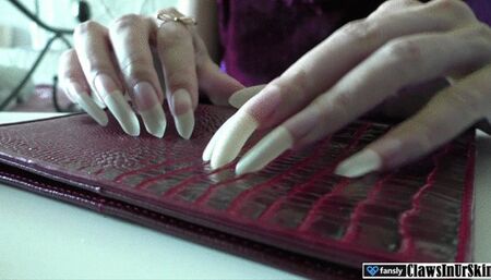 scratching my name signature on your wallet with my nails