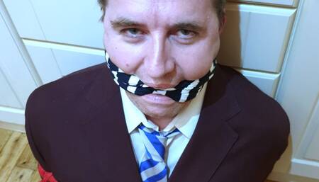 Man in adult school uniform bound and gagged on kitchen floor - cam 2 part 1