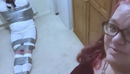 Duct taped man made to cum