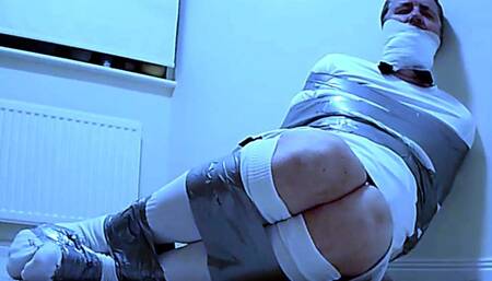 Man duct taped in all white football kit and left in room - Part 1