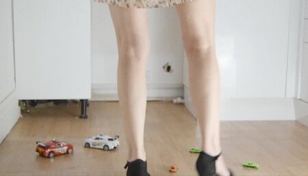 April Crushes toys in pleated skirt