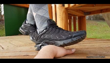 hand trample in dirty used Nike TN sneakers