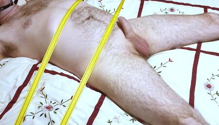Naked Man has wand used on his cock whilst gagged and bound to bed