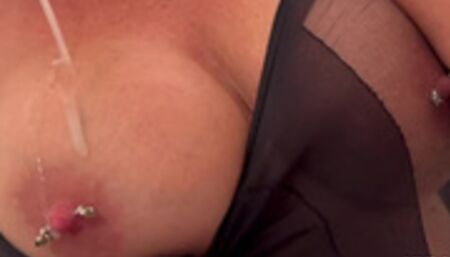 MILF Spitting Cum on Tits and Pierced Nipples