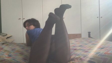 I ignore you on the bed in fishnet stockings