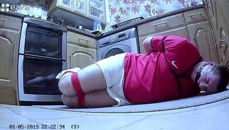 Footballer bound and gagged tight and made to crawl to kitchen