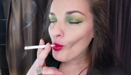Bright red lips on an all white cigarette