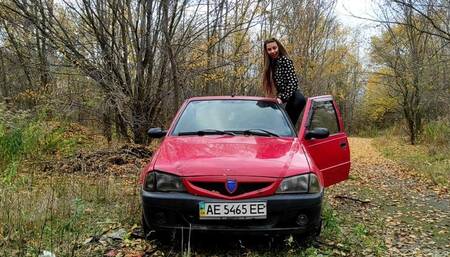 Bouncing and shaking red car Dacia