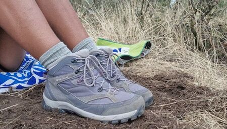 my tired feet after hike in the mud