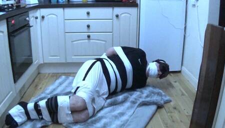 Taped up footballer in my kitchen
