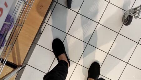 Shoeplay and footplay while shopping (avi)