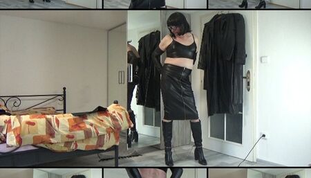 Ballgagged sissy Katja in leather and handcuffs