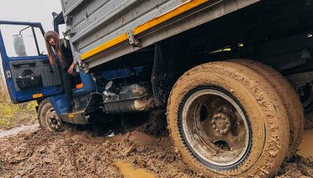 CAR STUCK Stuck on a truck in the mud trying to turn around