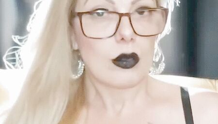 * Close-up * Marlboro reds * Dangling * Nose exhales * Black Lipstick