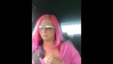 Sukie Rae plays with her tits while driving.
