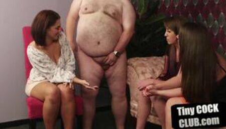 Fat guy with small dickie wanked by busty femdom group