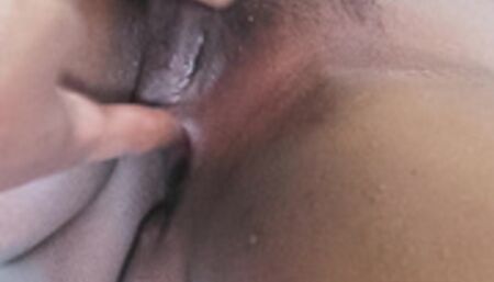 Ebony lesbian cums on double fingering asshole and black pussy