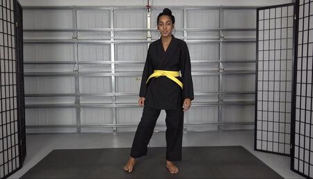 CLAIRE EARNS HER ORANGE BELT