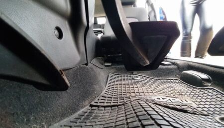 Driving in Buffalo Boots Shiny Leggings Under Pedal Mazda