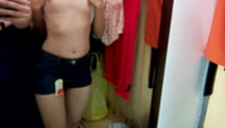 Choosing new outfits for my future videos in the fitting room